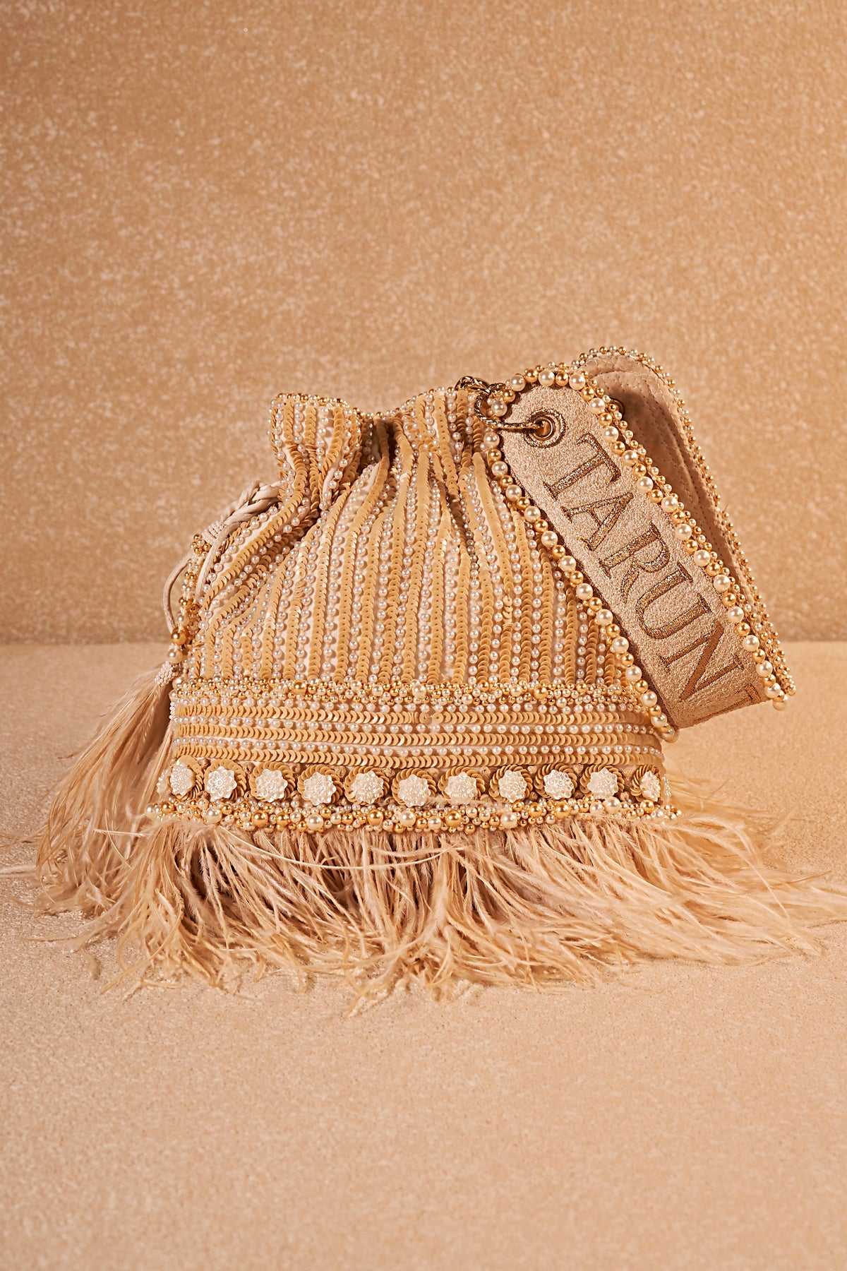 Embroidered Potli With Feather