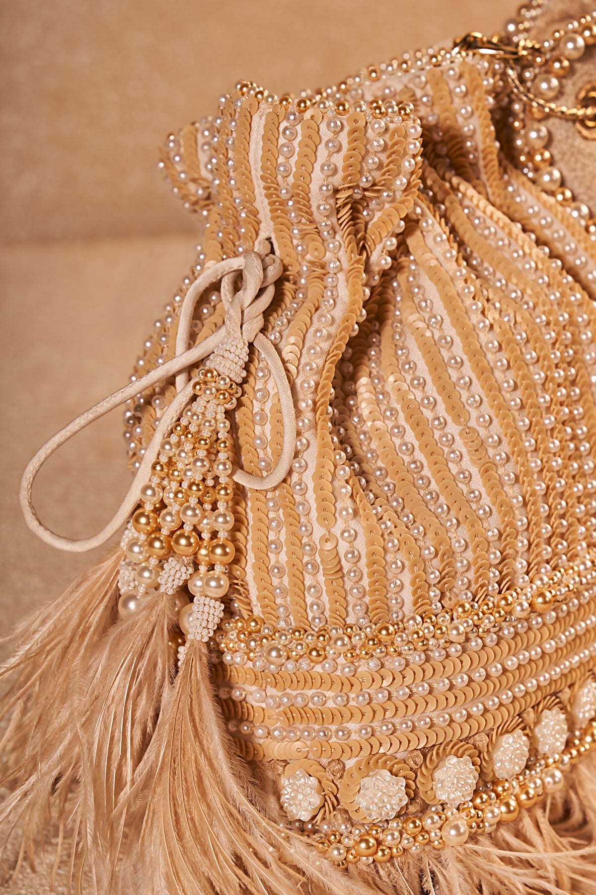 Embroidered Potli With Feather
